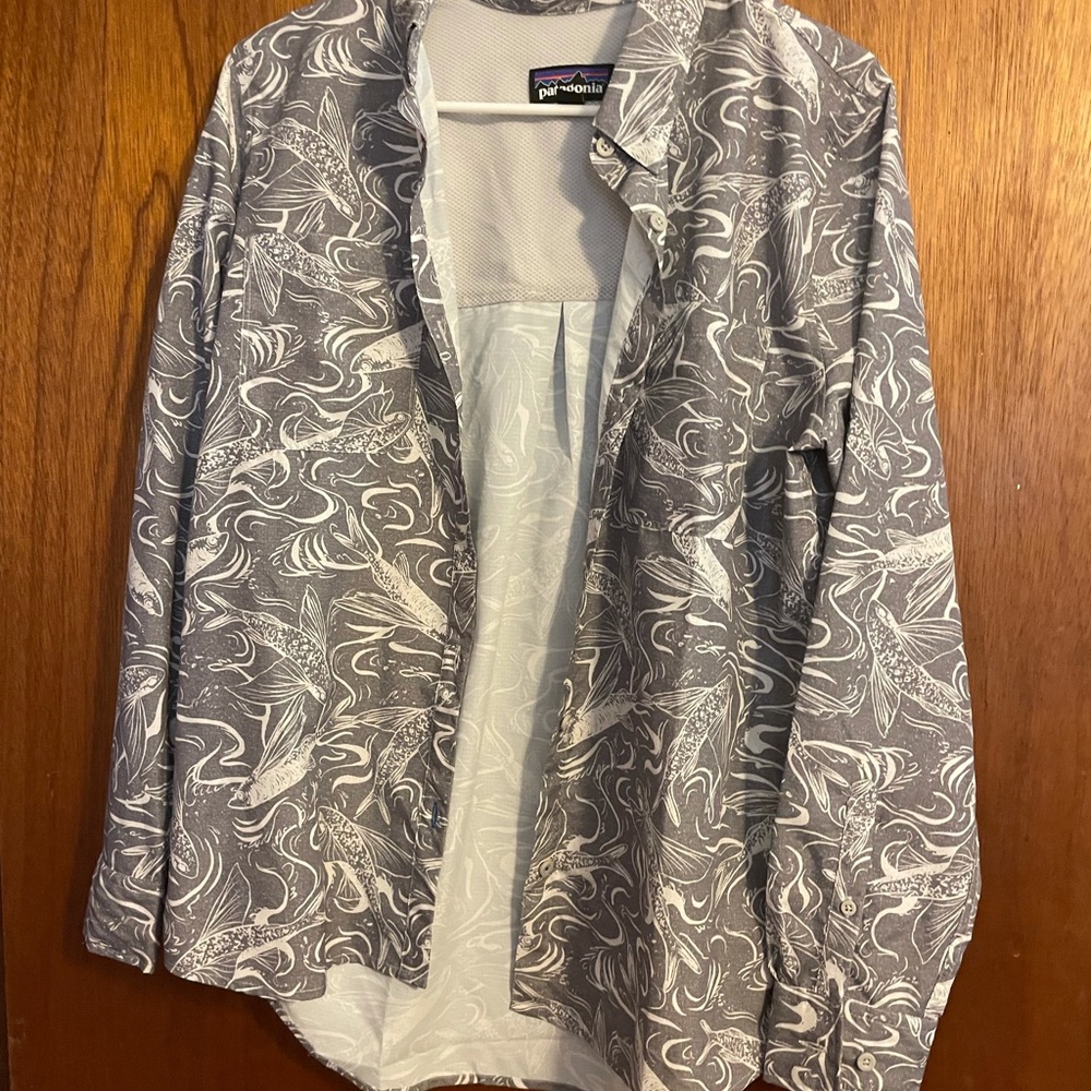 Woman’s Patagonia long sleeve sun protector shirt